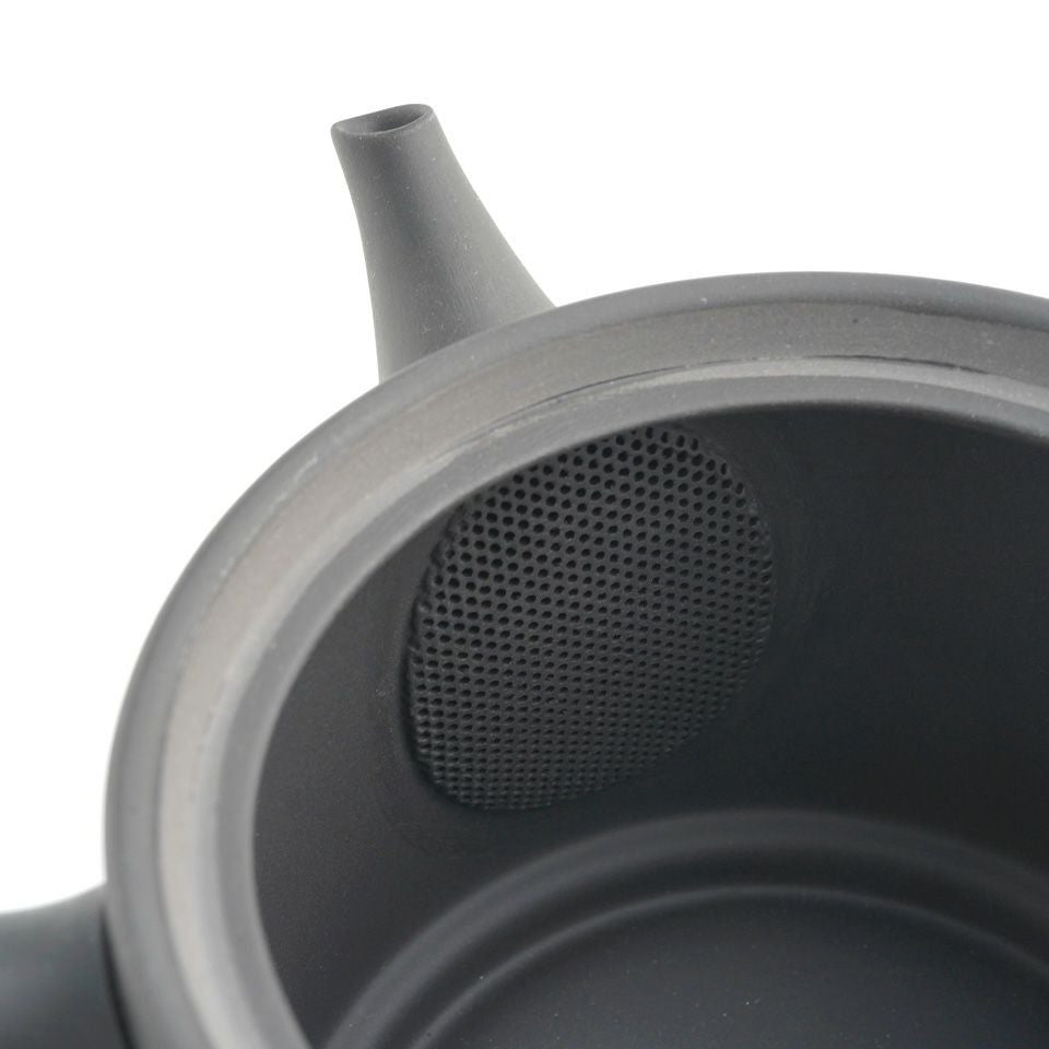 Built-in ceramic mesh strainer inside the black Jinsui kyusu