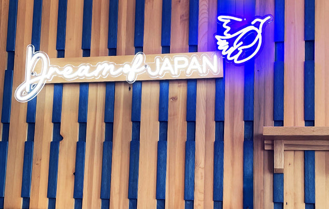 The Story Behind Our Booth Backdrop: Craftsmanship, Engineering, and Sacred Wood