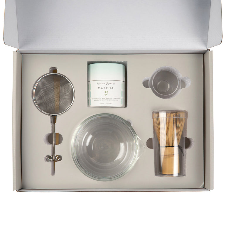 Tea-making set with a canister, bowl, spoon, and glass in a box